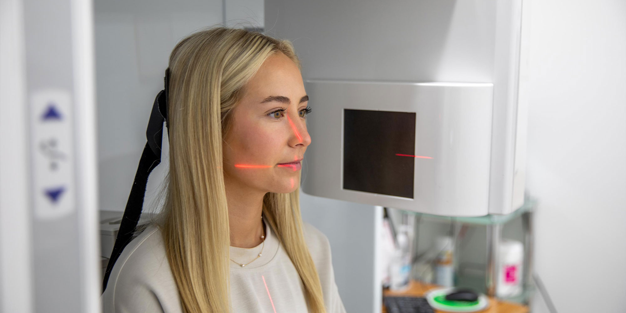 Patient within 3D scanning device for dental procedure